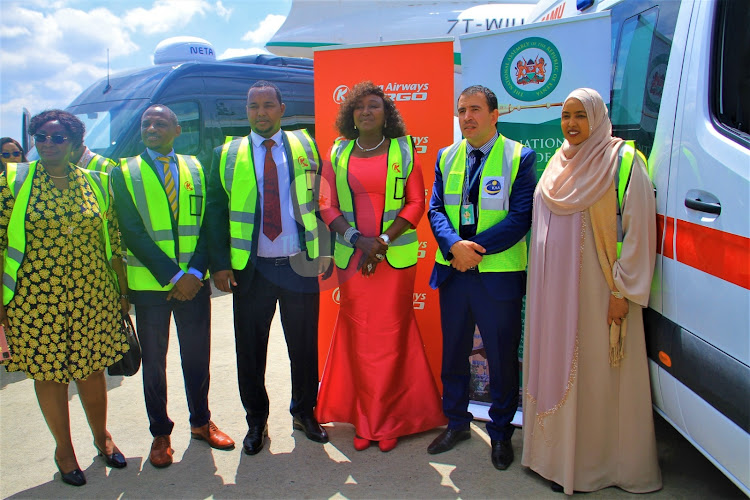 Ag. Algerian Ambassador Hamza Karour with National Assembly Deputy Speaker Gladys Shollei and other dignitaries pose for a photo after handing over the two vehicles on May 18,2023.