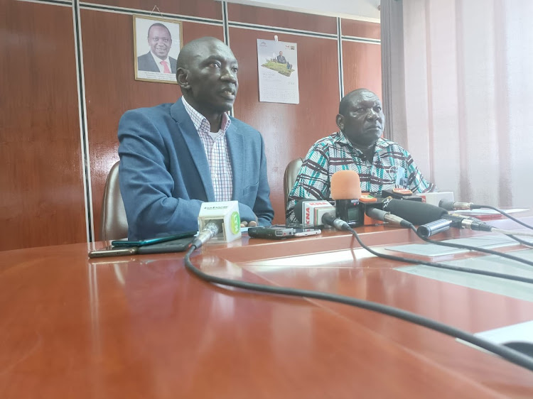 LIFE BEYOND ELECTION: Government spokesperson Col (Rtd) Cyrus Oguna with Nyanza Regional Commissioner Magu Mutindika during a press briefing in Kisumu on Friday.