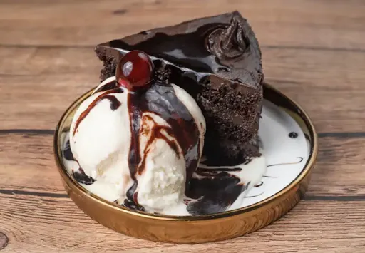 Chocolate Truffle Cake With Ice Cream & Chocolate Sauce