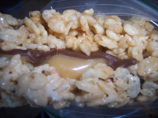 From an aerial view they look like a typical Rice Krispy bar, but look at a side view and BAM! hidden gooey yumminess!