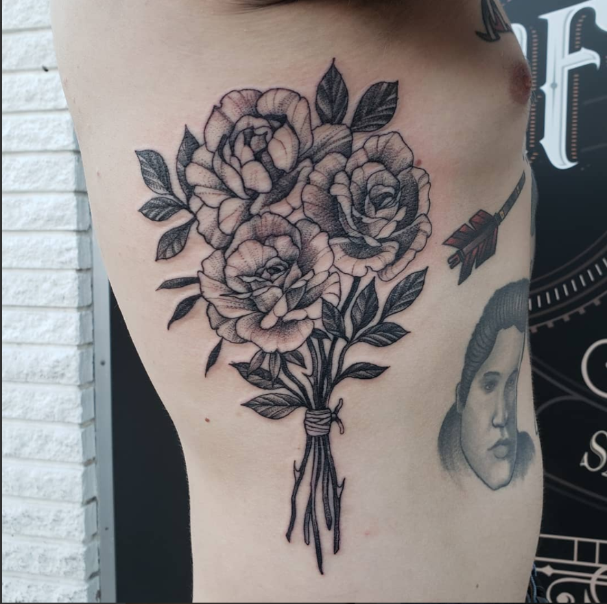 Flower Themed Rib Tattoos 12