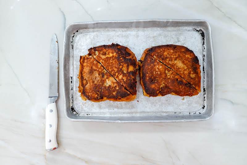 Fried Sandwiches Ready To Be Cut In Half.