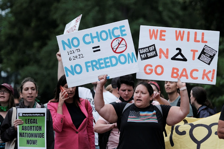 Women's March activists. Indiana state Attorney General Todd Rokita said Dr. Caitlin Bernard could face "criminal prosecution and licensing repercussions" if she failed to file the required reports on time.