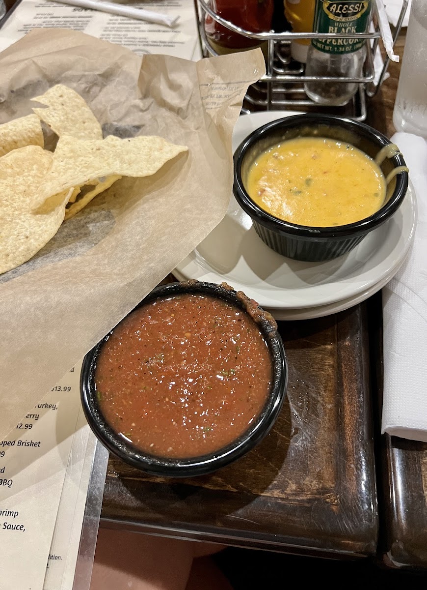 Bring your own chips - the salsa & queso are gf!