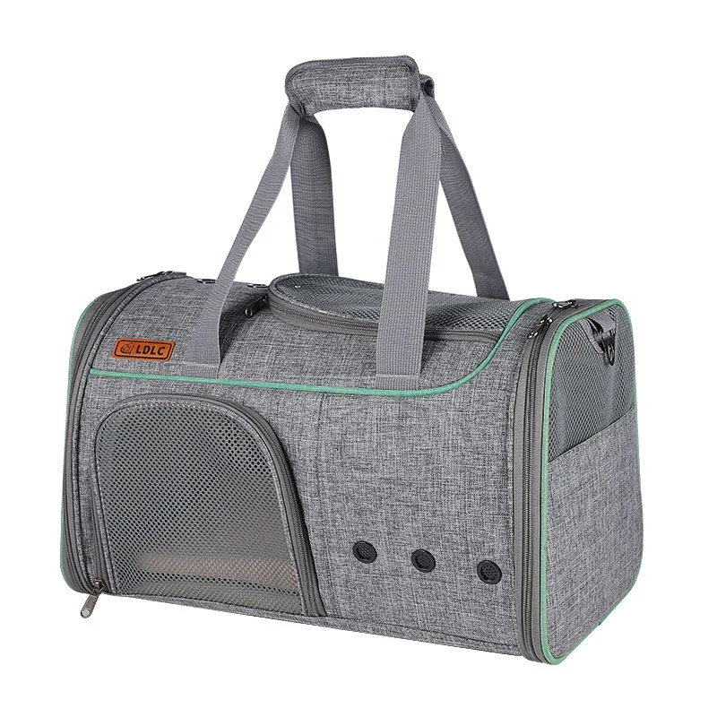 Bolsa de mano portátil para mascotas Go Out de tela Oxford catiónica. Ideal para viajes, cómoda, segura y fácil de transportar a tu amigo peludo.