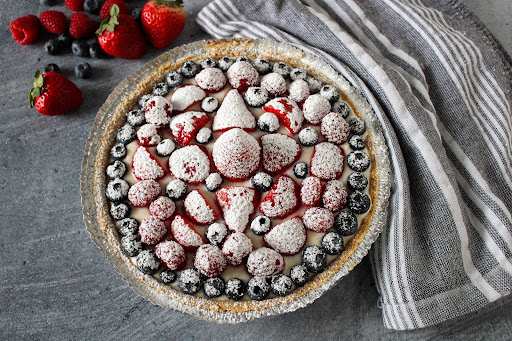 Fresh Berry Pie sprinkled with confectioners' sugar.