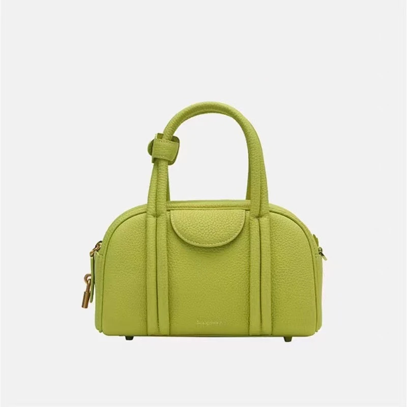 Sac à main en cuir Bowling Boston Toe, l'accessoire parfait pour toutes les occasions. Spacieux, élégant et conçu pour le confort.