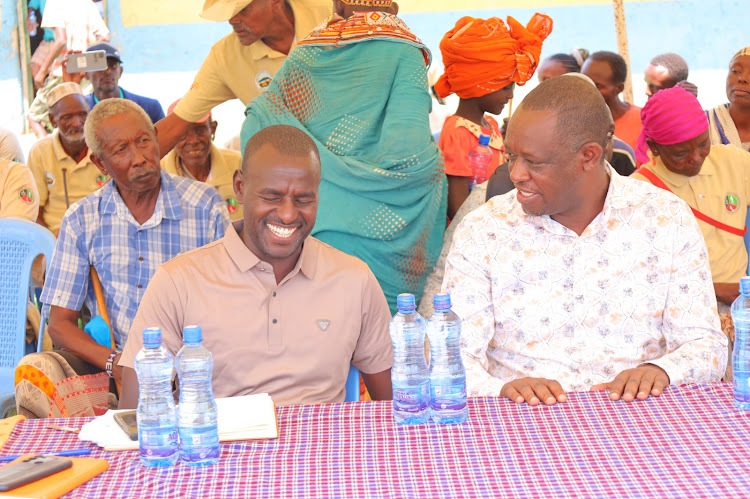 Marsabit Deputy Governor Solomon Gubo with CECM Culture, Gender and Social Services Jeremy Ledaany during the international day of person living with disabilities on Sunday at Loglogo