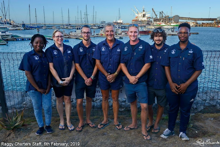 Raggy Charters won a 2019 national Lilizela tourism award in the Visitor Experience/ Marine Adventure category. The Raggy team are, from left, Purity Khosa, Karen Keeton, Warren Tarboton, founder Lloyd Edwards, Jake Keeton, volunteer Albert Cámara Balestegui and Abongile Mkhunyana