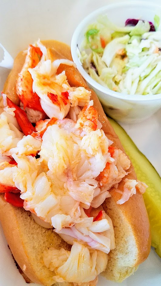 Cousins Maine Lobster in West Hollywood in Los Angeles, California, the only brick and mortar restaurant location besides the food trucks This is their Connecticut Lobster Roll, served warm with butter and lemon on a New England style roll.