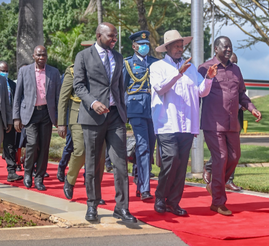 Transport CS Kipchumba Murkomen and Azimio la Umoja leader Raila Odinga see off Uganda's President Yoweri Museveni after his three day State visit on May 17, 2024.