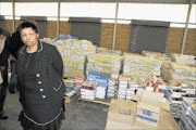 READ BY NOBODY: 
      Minister of Basic Education  Angie Motshekga during her visit to the Department of Education warehouse in Polokwane 
      
       to instruct  the  education 
      
      department to distribute 
      
       text books urgently. 
      PHOTO: ELIJAR MUSHIANA