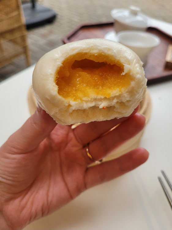 The gooey centre of a salted egg bun.