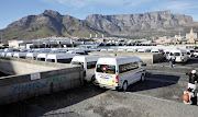 Taxis wait to take Cape Town's commuters home on the station deck on Tuesday. From Friday, this is likely to be empty space. 