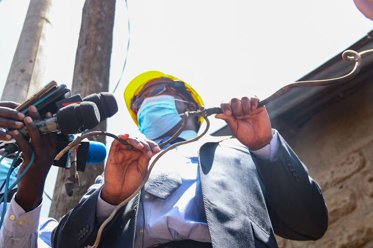 Managing director and CEO Bernard Ngugi at Huruma Estate Nairobi on 15 March during the operation of countrywide inspection by the KPLC to curb illegal electricity connections and enhance efficiency in distribution