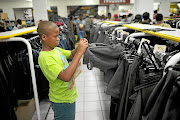 Agenda Rachoshi looking at new school uniforms at Mary's Outfitters in Pretoria before the reopening of  schools next week.