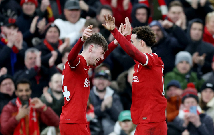 Conor Bradley celebrates scoring Liverpool's second goal with Curtis Jones in their Premier League win against Chelsea at Anfield in Liverpool on Wednesday.