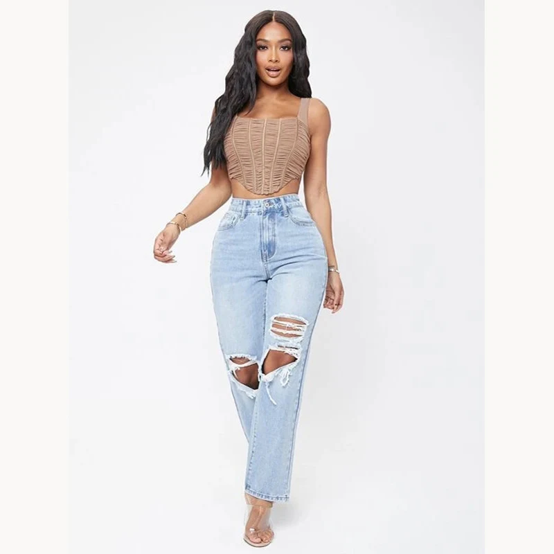 Jean taille haute délavé pour femme, à la mode. Un jean confortable et élégant pour un look décontracté et flatteur. Idéal au quotidien.