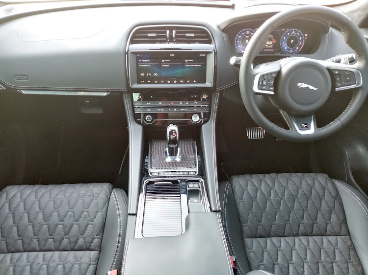 The interior is more aristocrat, with a touch of boy racer thanks to shiny pedals and carbon fibre trim. Picture: PHUTI MPYANE