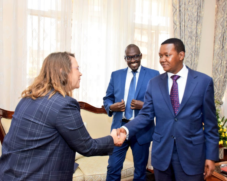 An official with Regional Representative of Bill and Melinda Gates Foundation Samburu Wa-Shiko and Foreign Affairs CS Alfred Mutua February 14,2023.