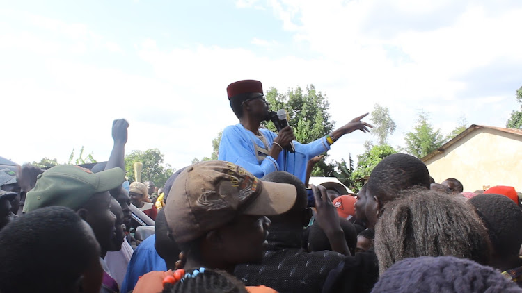 Kimilili MP Didmus Barasa addressing residents at Bahai in Kimilili on Wednesday, March 2.