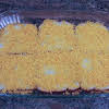 Thumbnail For Sprinkling Bread With Cheese.