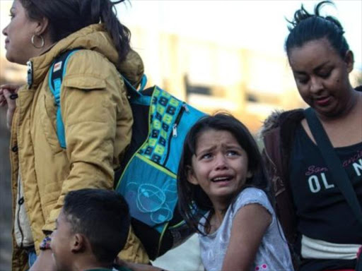 Migrants arriving at the US-Mexico border say they are fleeing persecution, poverty and violence. /BBC