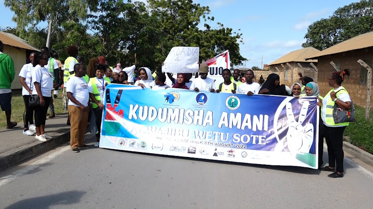 Civil Rights Organisations in Malindi take part in a peace walk to sensitize residents against being used to cause violence during the elections