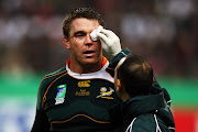 John Smit receives treatment during the IRB 2007 Rugby World Cup final between South Africa and England at the Stade de France in St Denis