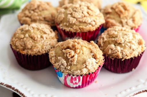 A plate of Banana Cranberry Crunch Breakfast Muffins.