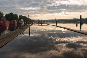 Early in the morning II by Jon Eggen -   ( fetsund, fetsund lensemuseum, sunrise, akershus, yellow, water, sun, norge, fet, floating, norway, skies, cabins )