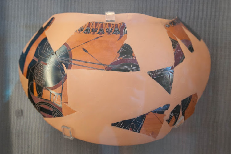 A piece of pottery called "Black Amphora," dating to about 550 BC, at the Acropolis Museum. 