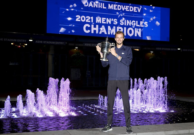 Daniil Medvedev of Russia celebrates with the championship trophy after defeating Novak Djokovic of Serbia to win the 2021 US Open at the USTA Billie Jean King National Tennis Center on September 12,2021 in New York City.