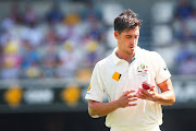 A file photo of Australian bowler Mitchell Starc shining the ball during a Test match against New Zealand in Brisbane.