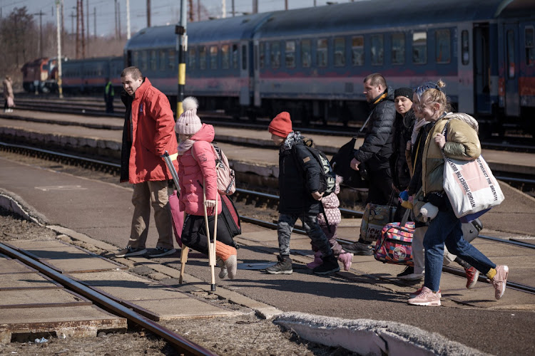 Refugees fleeing Ukraine arrive into Hungary at Zahony train station on March 14 2022 in Zahony, Hungary. Picture: GETTY IMAGES/CHRISTOPHER FURLONG