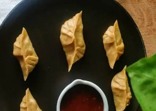 Tofu. Tom Yum Steam Wheat Momos (6 Pcs)