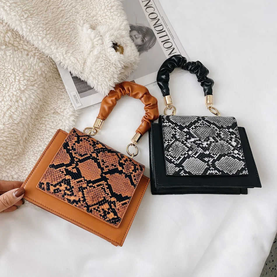 Bolso de mano diagonal con un solo hombro para mujer, elegante y moderno. Perfecto para looks chic y funcionales, ideal para llevar tus esenciales.