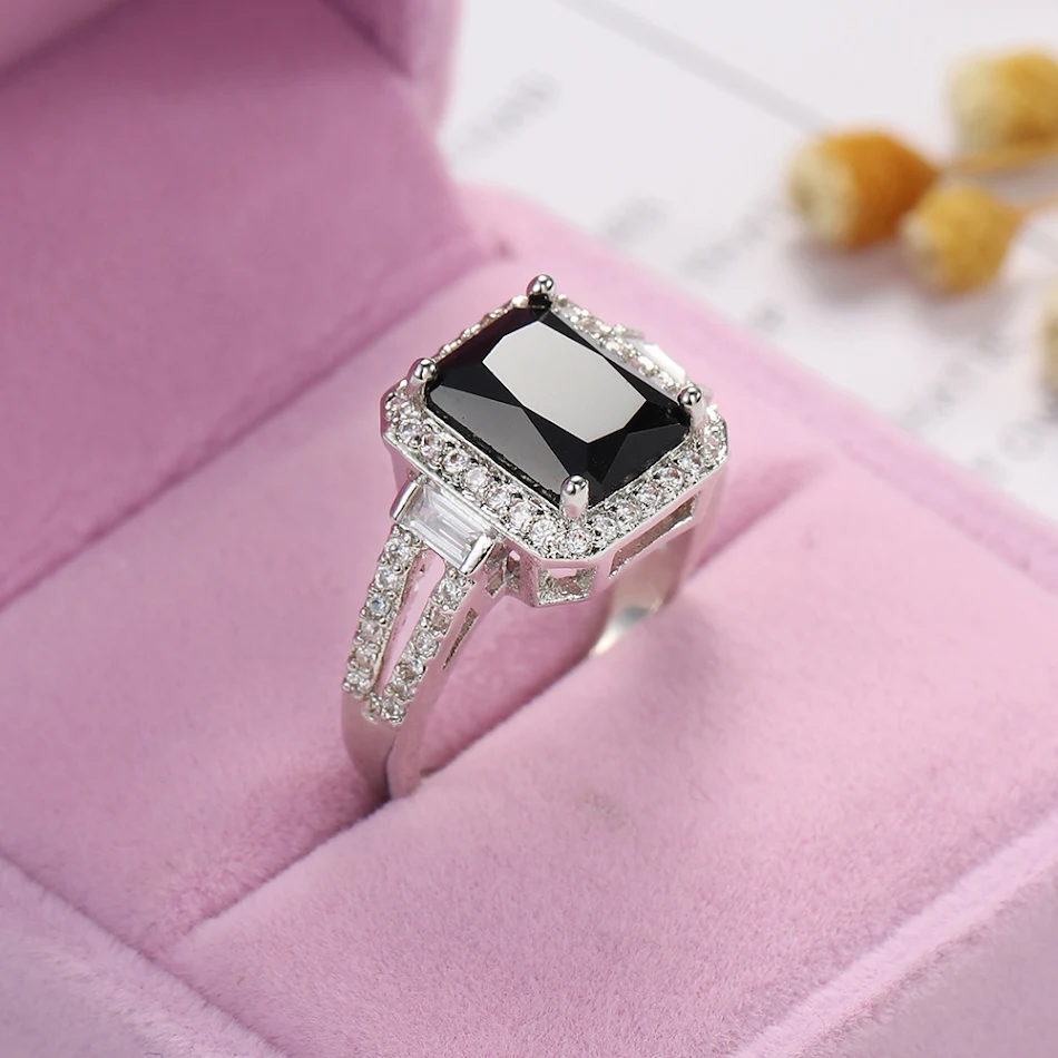 Europa en Amerika creatieve ring voor koppels, mode met zwarte zirkonia. Stijlvolle ring voor hem en haar. Een perfect cadeau om liefde te vieren.