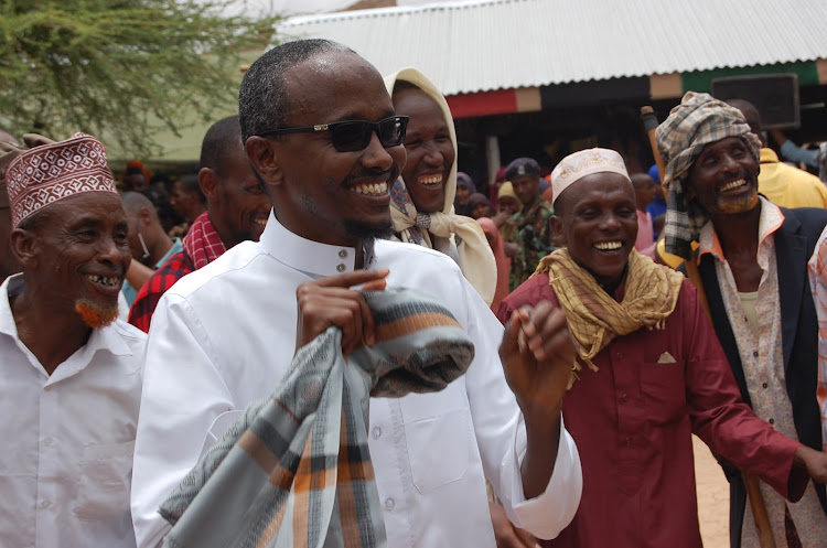 lagdera MP Mohamed Hire with his constituensts in modogashe town last week. he called on the government to move with speed and arrest the killers as well as restore sanity.