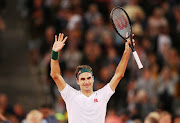 Roger Federer celebrates winning the Match in Africa against Rafael Nadal at Cape Town Stadium on February 7 2020.