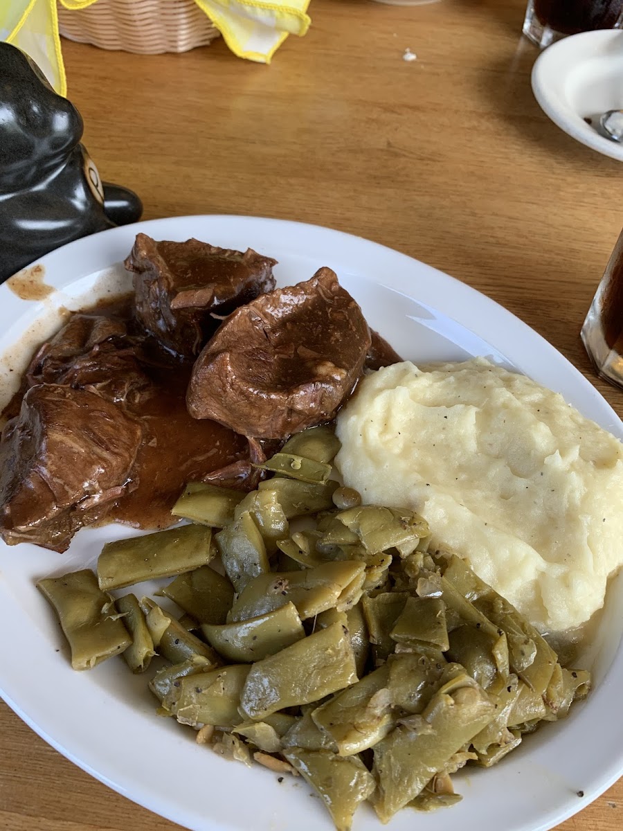 Gluten Free pot roast, gravy, mashed potatoes and green beans.