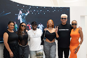 AKA's mother Lynn Forbes, DJ Zinhle, Mörda, Nadia Nakai, AKA's father Tony Forbes and Moozlie at AKA's art and merchandise exhibition. 