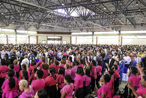 Hundreds of Enlightened Christian Gathering church worshippers at the Pretoria Events Centre break into song and dance during yesterday's service in Tshwane. / FACEBOOK
