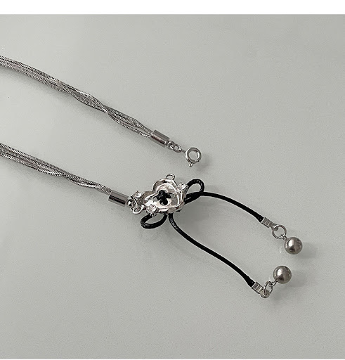 Title 8, Love Button Stitching Bow Necklace, a charming ...