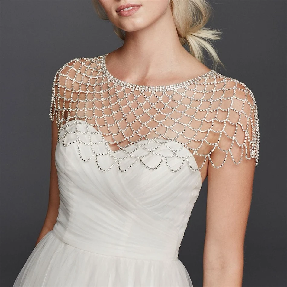 Chaîne d'épaule à franges longues en résille de strass, idéale pour robe de mariée, soirée, ou mariage. Écharpe cristal, style unique.