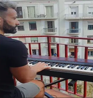 Alberto Gestoso, a pianist in Barcelona, Spain, moved his piano onto his balcony, where he played a few numbers for the neighbours.