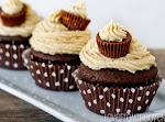 Peanut Butter Ball Stuffed Chocolate Cupcakes was pinched from <a href="http://www.lovefromtheoven.com/2012/03/31/peanut-butter-ball-chocolate-cupcakes-with-peanut-butter-buttercream/" target="_blank">www.lovefromtheoven.com.</a>