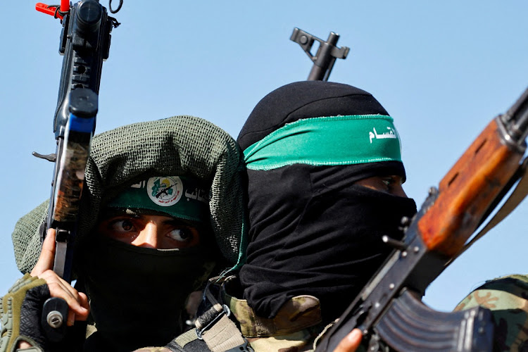 Hamas fighters. Picture: IBRAHEEM ABU MUSTAFA/REUTERS