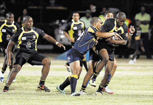 SINKING HIS TEETH IN: Border Bulldogs’ Lundi Ralarala, with ball, will be hoping to see his side emerge victorious when they take on Lions at the Emirates in Johannesburg on Friday afternoon Picture: GALLO IMAGES