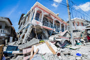 Houses destroyed following a 7.2 magnitude earthquake in Les Cayes, Haiti on Saturday.